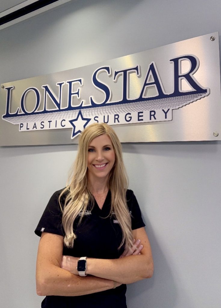 Nurse Injector Candace Evans in black scrubs in front of Lone Star Plastic Surgery sign.